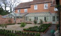 Large gabled Conservtaory with lean to link